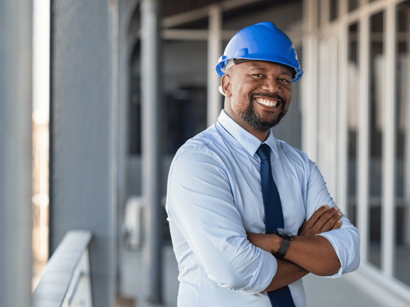 Contractor Smiling on Work Site